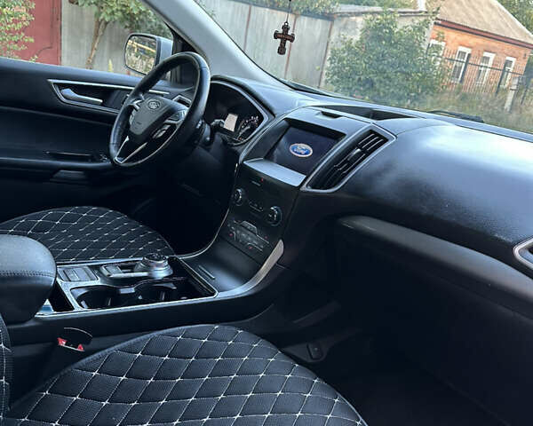 Серый Форд Эдж, объемом двигателя 2 л и пробегом 140 тыс. км за 19000 $, фото 10 на Automoto.ua