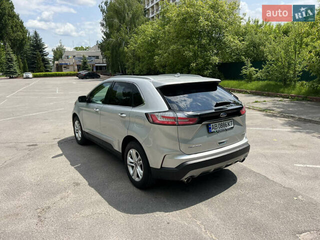 Серый Форд Эдж, объемом двигателя 2 л и пробегом 210 тыс. км за 19000 $, фото 2 на Automoto.ua