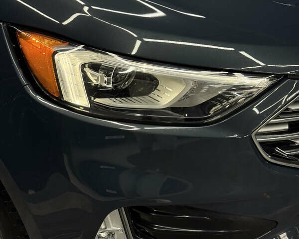 Сірий Форд Едж, об'ємом двигуна 2 л та пробігом 111 тис. км за 19999 $, фото 5 на Automoto.ua