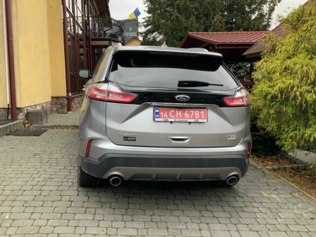 Серый Форд Эдж, объемом двигателя 2 л и пробегом 150 тыс. км за 15900 $, фото 4 на Automoto.ua