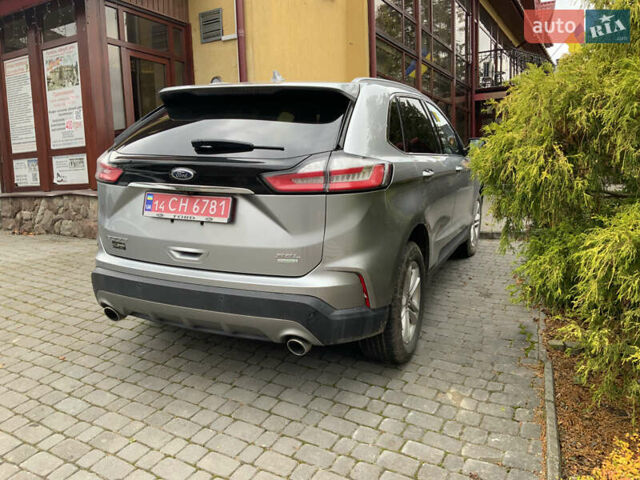 Серый Форд Эдж, объемом двигателя 2 л и пробегом 150 тыс. км за 15900 $, фото 5 на Automoto.ua