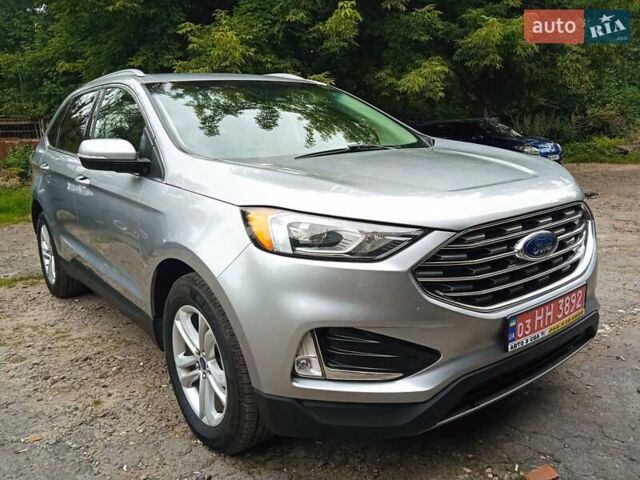 Серый Форд Эдж, объемом двигателя 2 л и пробегом 218 тыс. км за 16700 $, фото 7 на Automoto.ua