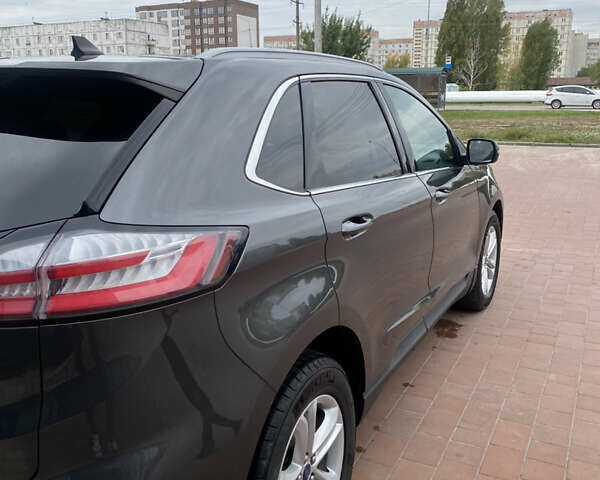 Серый Форд Эдж, объемом двигателя 2 л и пробегом 151 тыс. км за 18699 $, фото 7 на Automoto.ua