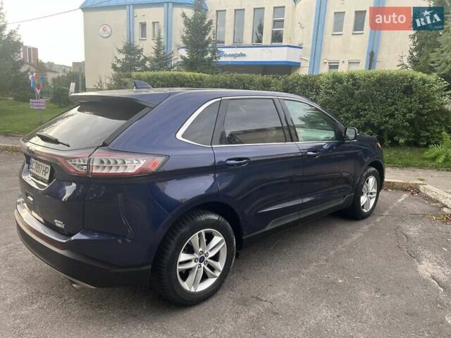 Синий Форд Эдж, объемом двигателя 2 л и пробегом 102 тыс. км за 15800 $, фото 3 на Automoto.ua