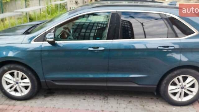 Синий Форд Эдж, объемом двигателя 2 л и пробегом 157 тыс. км за 15500 $, фото 1 на Automoto.ua