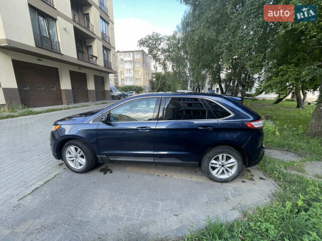 Синий Форд Эдж, объемом двигателя 2 л и пробегом 145 тыс. км за 11500 $, фото 5 на Automoto.ua