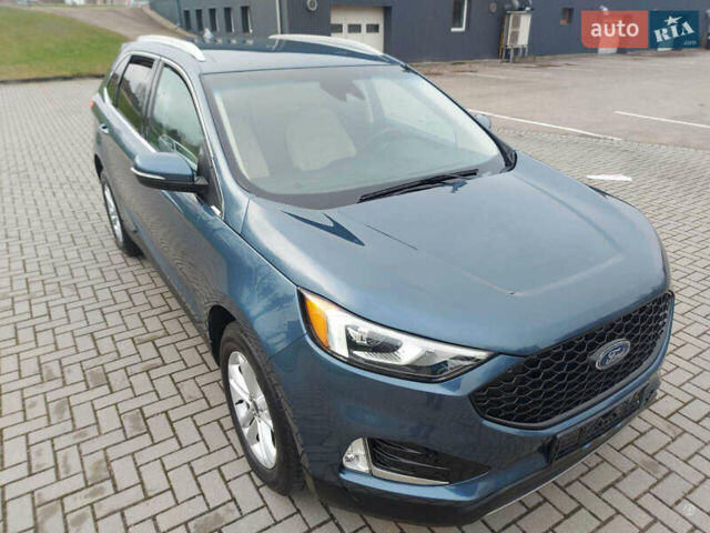Синий Форд Эдж, объемом двигателя 2 л и пробегом 140 тыс. км за 15800 $, фото 5 на Automoto.ua