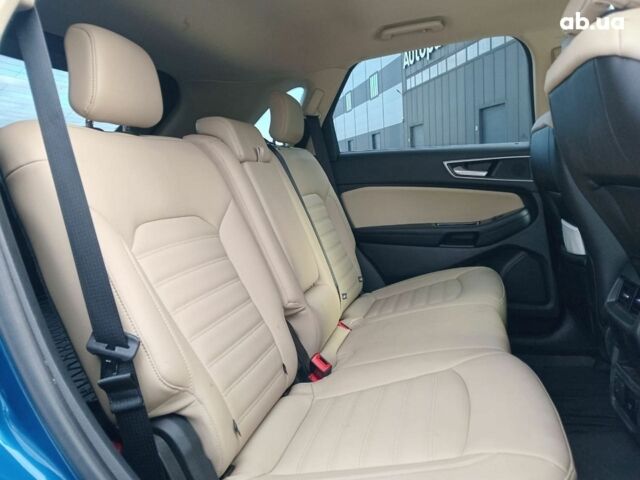 Синий Форд Эдж, объемом двигателя 2 л и пробегом 128 тыс. км за 19190 $, фото 16 на Automoto.ua