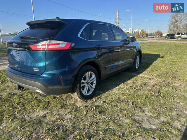 Синий Форд Эдж, объемом двигателя 2 л и пробегом 130 тыс. км за 17700 $, фото 4 на Automoto.ua