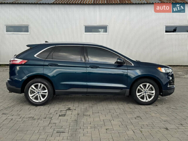 Синий Форд Эдж, объемом двигателя 2 л и пробегом 97 тыс. км за 17300 $, фото 1 на Automoto.ua