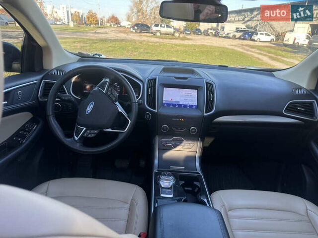 Синий Форд Эдж, объемом двигателя 2 л и пробегом 130 тыс. км за 17700 $, фото 12 на Automoto.ua
