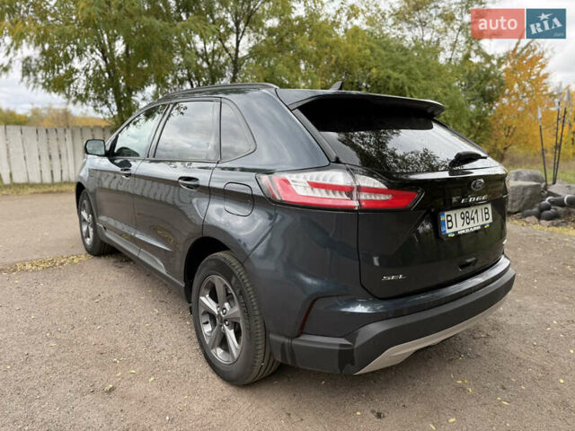 Синий Форд Эдж, объемом двигателя 2 л и пробегом 32 тыс. км за 25000 $, фото 6 на Automoto.ua