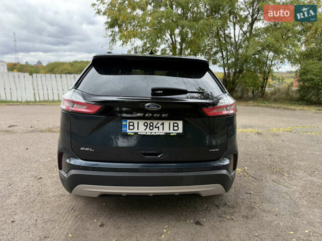 Синий Форд Эдж, объемом двигателя 2 л и пробегом 32 тыс. км за 25000 $, фото 7 на Automoto.ua