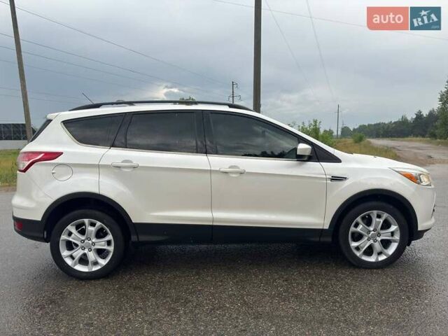 Белый Форд Эскейп, объемом двигателя 2 л и пробегом 145 тыс. км за 11650 $, фото 9 на Automoto.ua