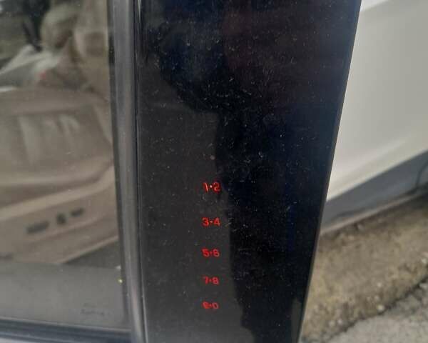 Белый Форд Эскейп, объемом двигателя 2 л и пробегом 196 тыс. км за 10700 $, фото 13 на Automoto.ua