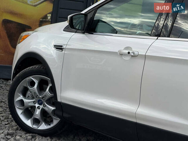 Белый Форд Эскейп, объемом двигателя 2 л и пробегом 179 тыс. км за 12600 $, фото 20 на Automoto.ua