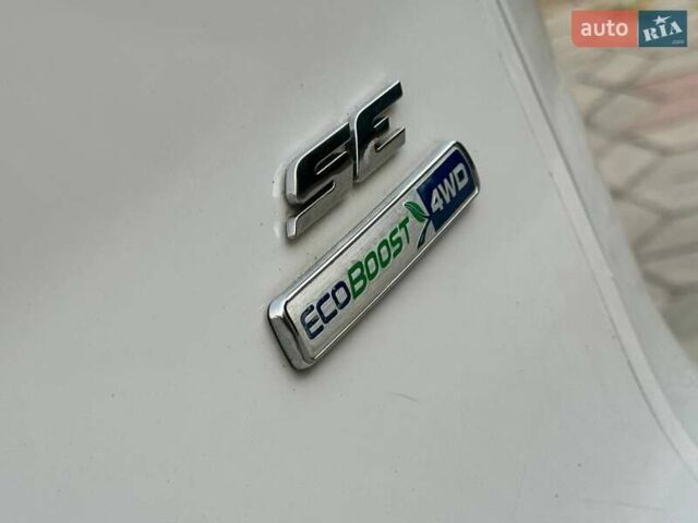 Белый Форд Эскейп, объемом двигателя 2 л и пробегом 140 тыс. км за 11400 $, фото 16 на Automoto.ua