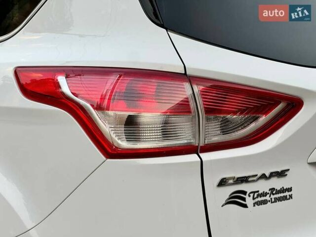 Белый Форд Эскейп, объемом двигателя 2 л и пробегом 140 тыс. км за 11400 $, фото 12 на Automoto.ua