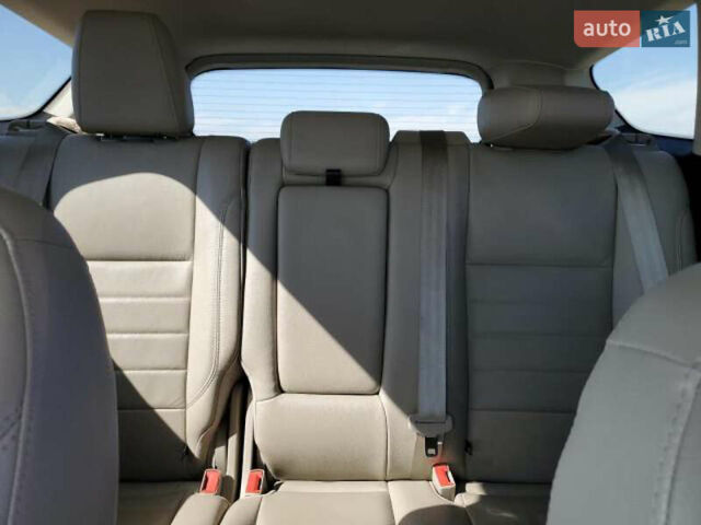 Белый Форд Эскейп, объемом двигателя 2 л и пробегом 125 тыс. км за 12500 $, фото 10 на Automoto.ua