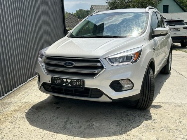 Белый Форд Эскейп, объемом двигателя 2 л и пробегом 216 тыс. км за 11900 $, фото 4 на Automoto.ua