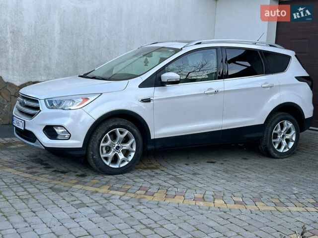 Белый Форд Эскейп, объемом двигателя 2 л и пробегом 217 тыс. км за 11900 $, фото 18 на Automoto.ua