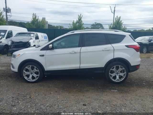 Білий Форд Ескейп, об'ємом двигуна 2 л та пробігом 115 тис. км за 2000 $, фото 13 на Automoto.ua