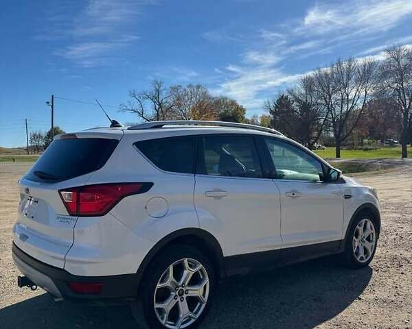 Белый Форд Эскейп, объемом двигателя 2 л и пробегом 119 тыс. км за 12500 $, фото 3 на Automoto.ua