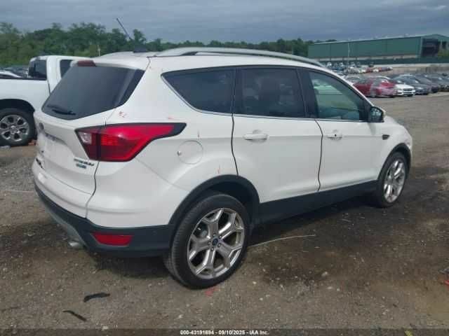 Білий Форд Ескейп, об'ємом двигуна 2 л та пробігом 115 тис. км за 2000 $, фото 3 на Automoto.ua