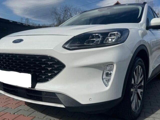 Белый Форд Эскейп, объемом двигателя 2 л и пробегом 81 тыс. км за 13000 $, фото 3 на Automoto.ua