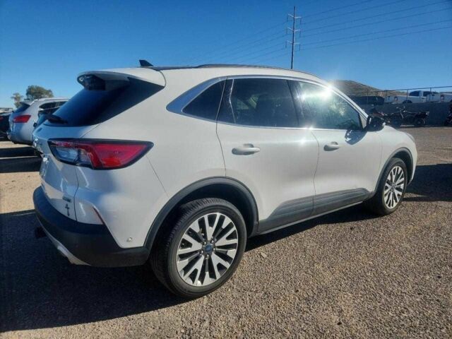 Белый Форд Эскейп, объемом двигателя 2 л и пробегом 67 тыс. км за 3500 $, фото 2 на Automoto.ua