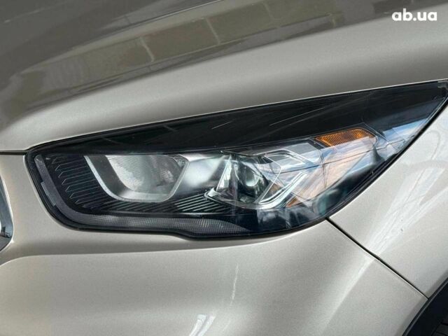 Бежевый Форд Эскейп, объемом двигателя 2 л и пробегом 195 тыс. км за 13490 $, фото 4 на Automoto.ua