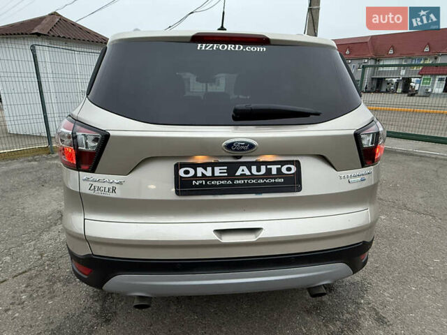 Бежевый Форд Эскейп, объемом двигателя 2 л и пробегом 128 тыс. км за 15990 $, фото 4 на Automoto.ua