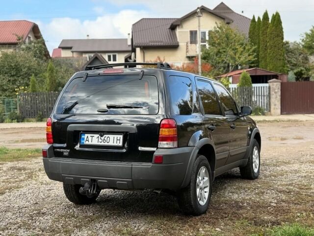 Черный Форд Эскейп, объемом двигателя 2.3 л и пробегом 241 тыс. км за 6250 $, фото 3 на Automoto.ua