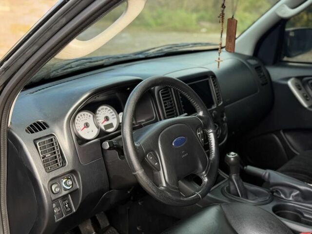 Черный Форд Эскейп, объемом двигателя 2.3 л и пробегом 241 тыс. км за 6250 $, фото 4 на Automoto.ua