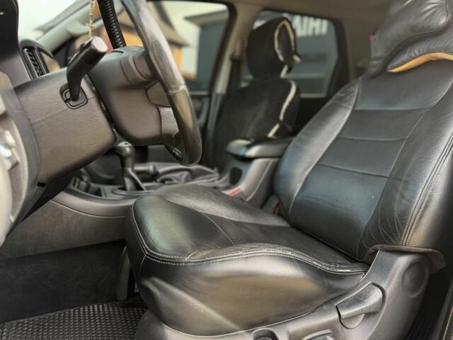 Черный Форд Эскейп, объемом двигателя 2.3 л и пробегом 241 тыс. км за 6250 $, фото 6 на Automoto.ua