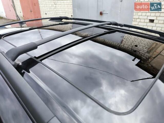 Черный Форд Эскейп, объемом двигателя 1.6 л и пробегом 165 тыс. км за 10900 $, фото 5 на Automoto.ua