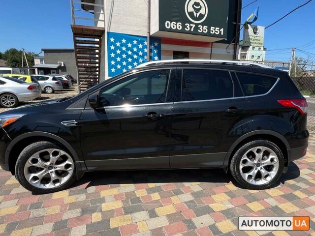 Черный Форд Эскейп, объемом двигателя 2 л и пробегом 186 тыс. км за 13500 $, фото 1 на Automoto.ua