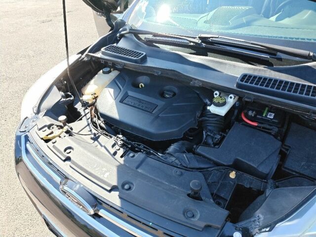 Черный Форд Эскейп, объемом двигателя 2 л и пробегом 131 тыс. км за 11200 $, фото 16 на Automoto.ua