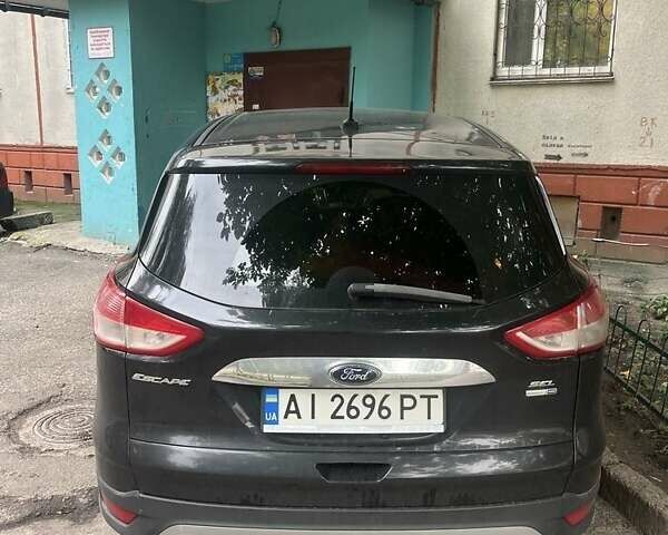 Черный Форд Эскейп, объемом двигателя 2 л и пробегом 201 тыс. км за 10200 $, фото 4 на Automoto.ua