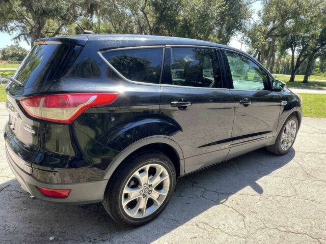 Черный Форд Эскейп, объемом двигателя 2 л и пробегом 87 тыс. км за 2100 $, фото 4 на Automoto.ua