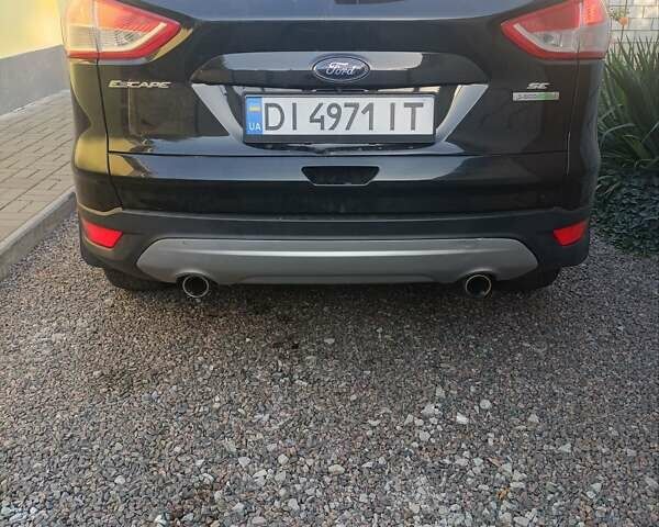 Черный Форд Эскейп, объемом двигателя 1.6 л и пробегом 220 тыс. км за 8500 $, фото 7 на Automoto.ua