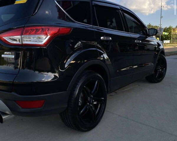 Черный Форд Эскейп, объемом двигателя 2 л и пробегом 220 тыс. км за 10300 $, фото 5 на Automoto.ua