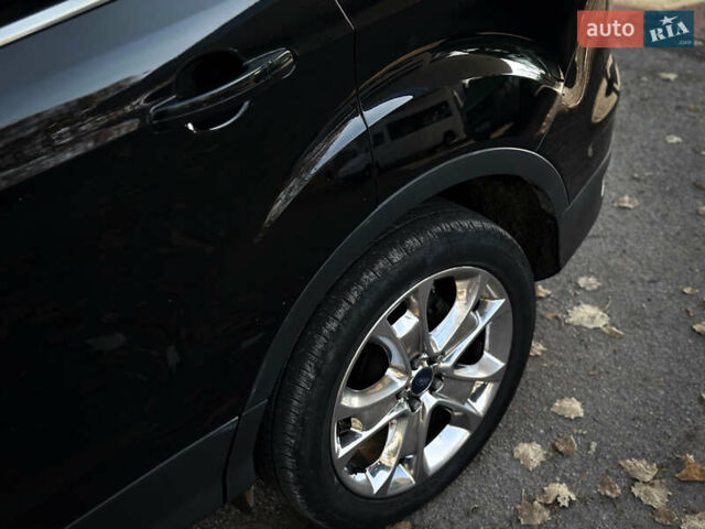Черный Форд Эскейп, объемом двигателя 2 л и пробегом 189 тыс. км за 9500 $, фото 10 на Automoto.ua