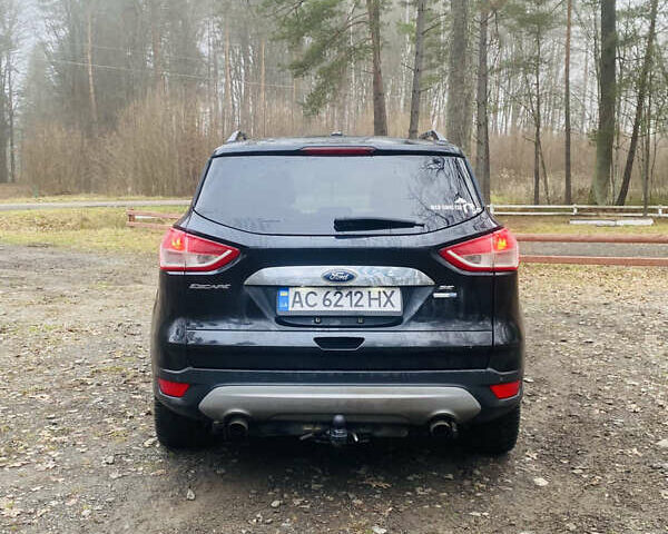 Черный Форд Эскейп, объемом двигателя 1.6 л и пробегом 232 тыс. км за 10999 $, фото 1 на Automoto.ua