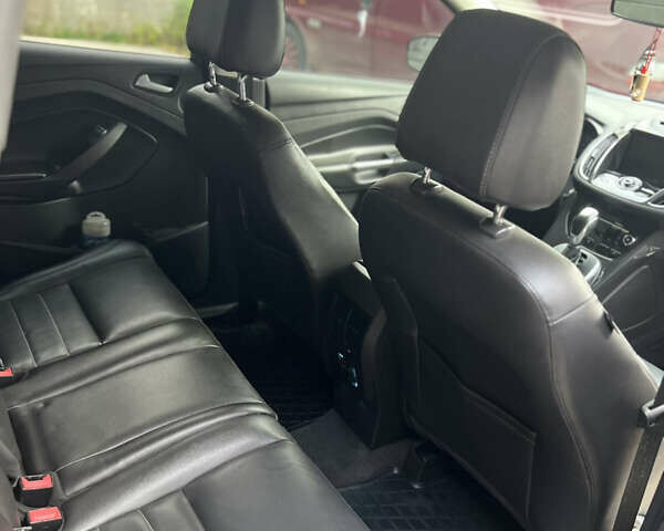 Черный Форд Эскейп, объемом двигателя 1.6 л и пробегом 145 тыс. км за 13000 $, фото 11 на Automoto.ua