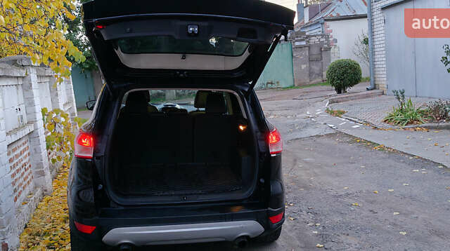 Черный Форд Эскейп, объемом двигателя 2 л и пробегом 140 тыс. км за 14000 $, фото 16 на Automoto.ua