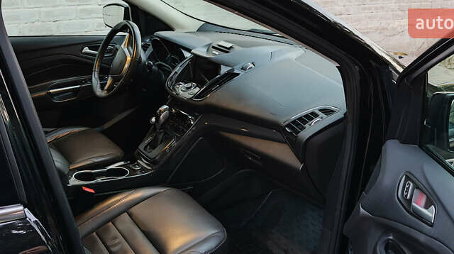 Черный Форд Эскейп, объемом двигателя 2 л и пробегом 140 тыс. км за 14000 $, фото 1 на Automoto.ua