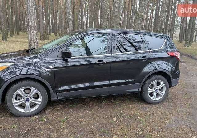 Черный Форд Эскейп, объемом двигателя 2 л и пробегом 87 тыс. км за 12700 $, фото 4 на Automoto.ua