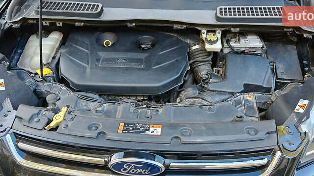 Черный Форд Эскейп, объемом двигателя 2 л и пробегом 140 тыс. км за 14000 $, фото 20 на Automoto.ua