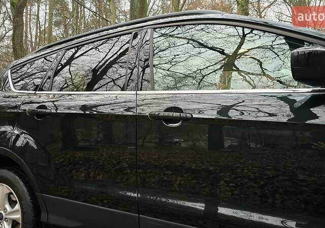 Черный Форд Эскейп, объемом двигателя 2 л и пробегом 122 тыс. км за 12000 $, фото 55 на Automoto.ua